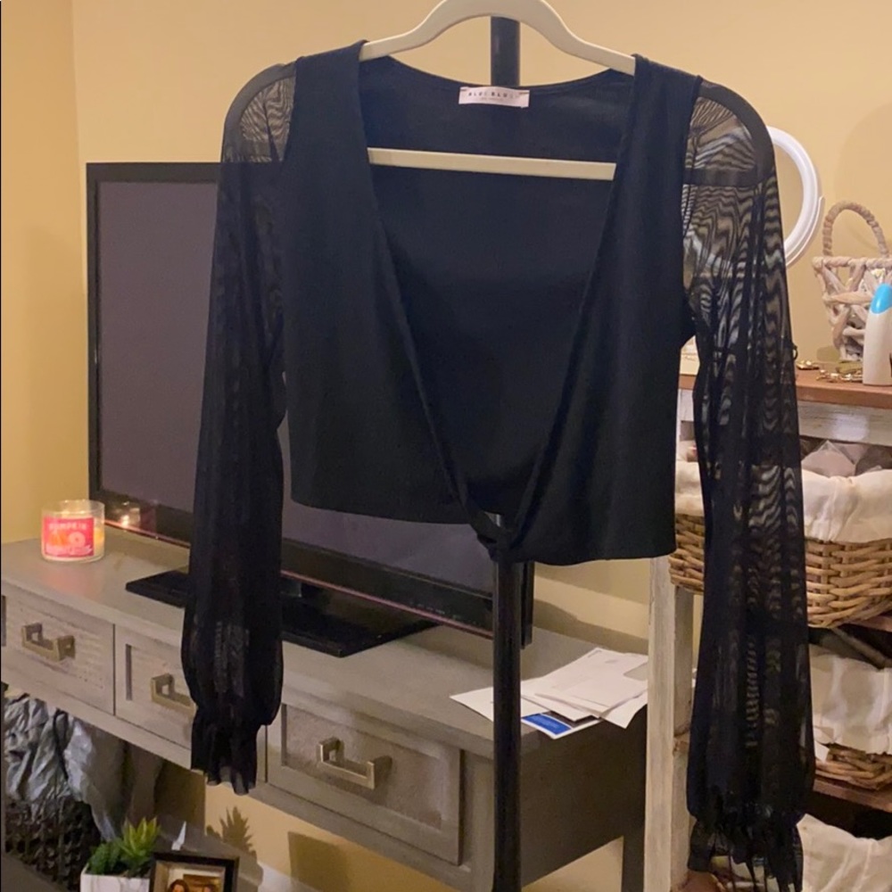 Sexy wrap up blouse. Never been worn!